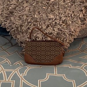 Beige Coach women coin purse.